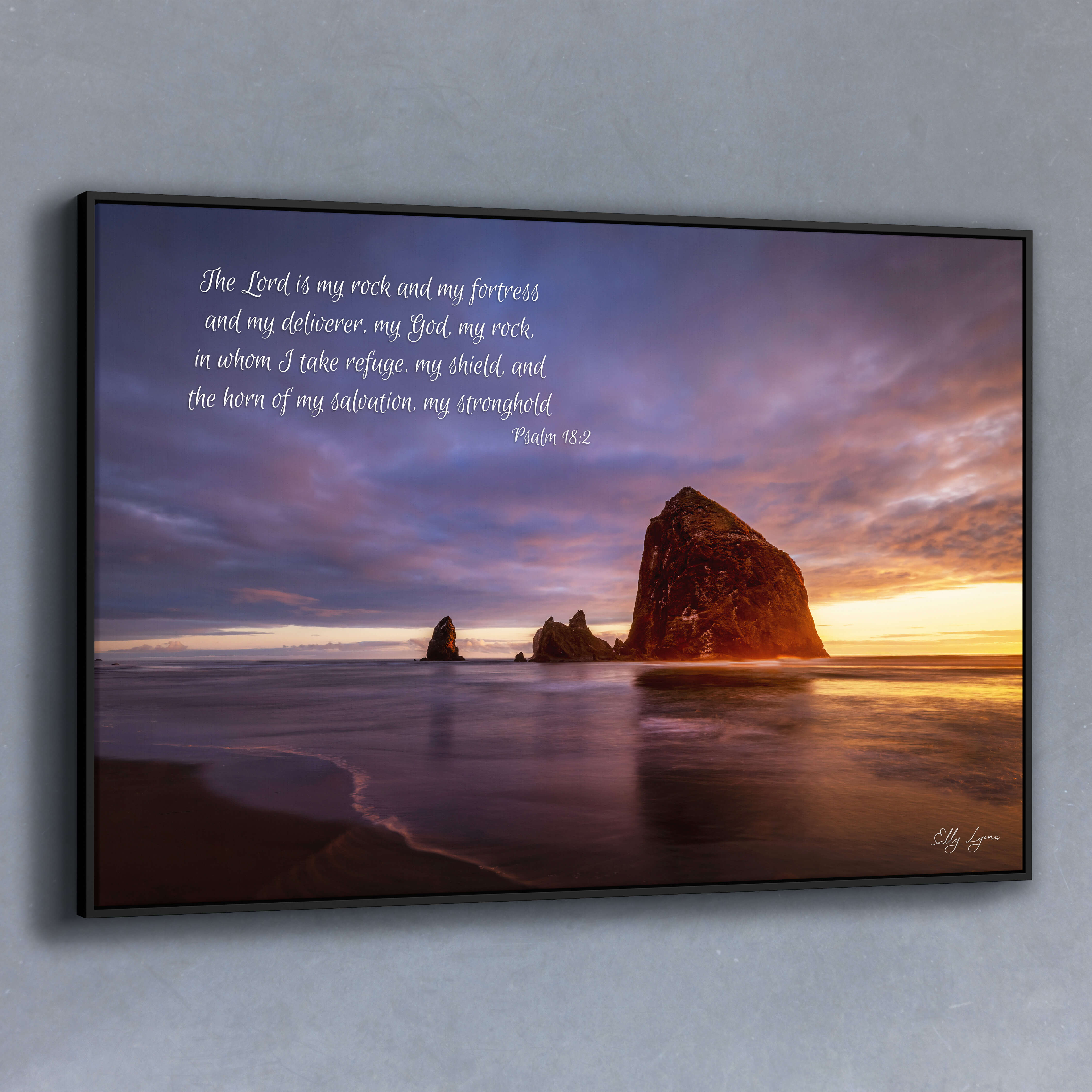 Christian coastal wall art of Haystack Rock at sunset with Psalm 18:2 — “The Lord is my rock and my fortress.”