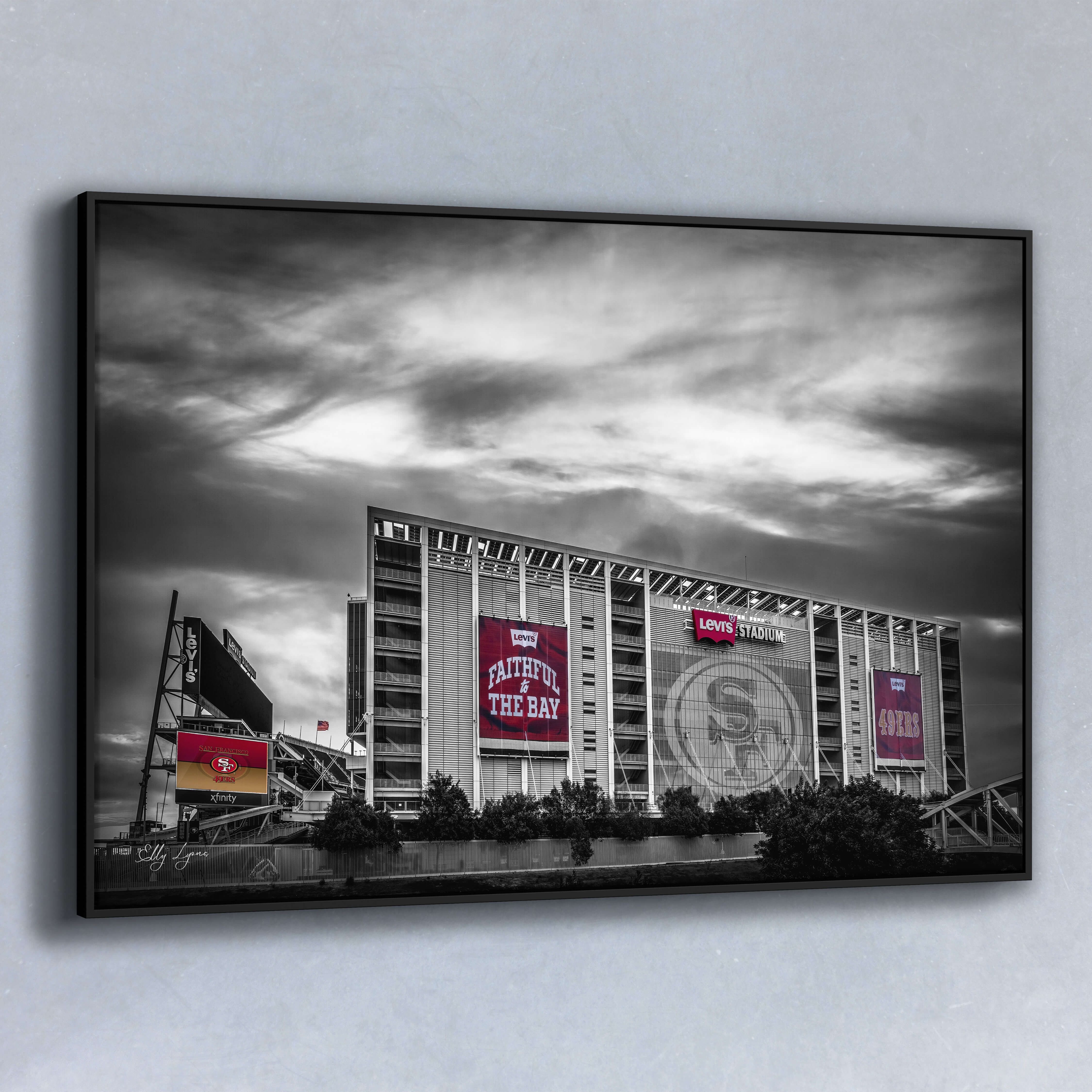Color splash fine art photo of Levi’s Stadium with bold red 49ers banners contrasted against a black and white sky, designed for sports fans and collectors.