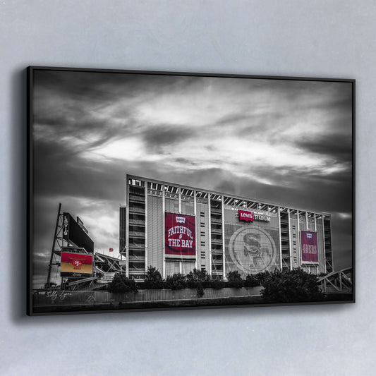 Color splash fine art photo of Levi’s Stadium with bold red 49ers banners contrasted against a black and white sky, designed for sports fans and collectors.