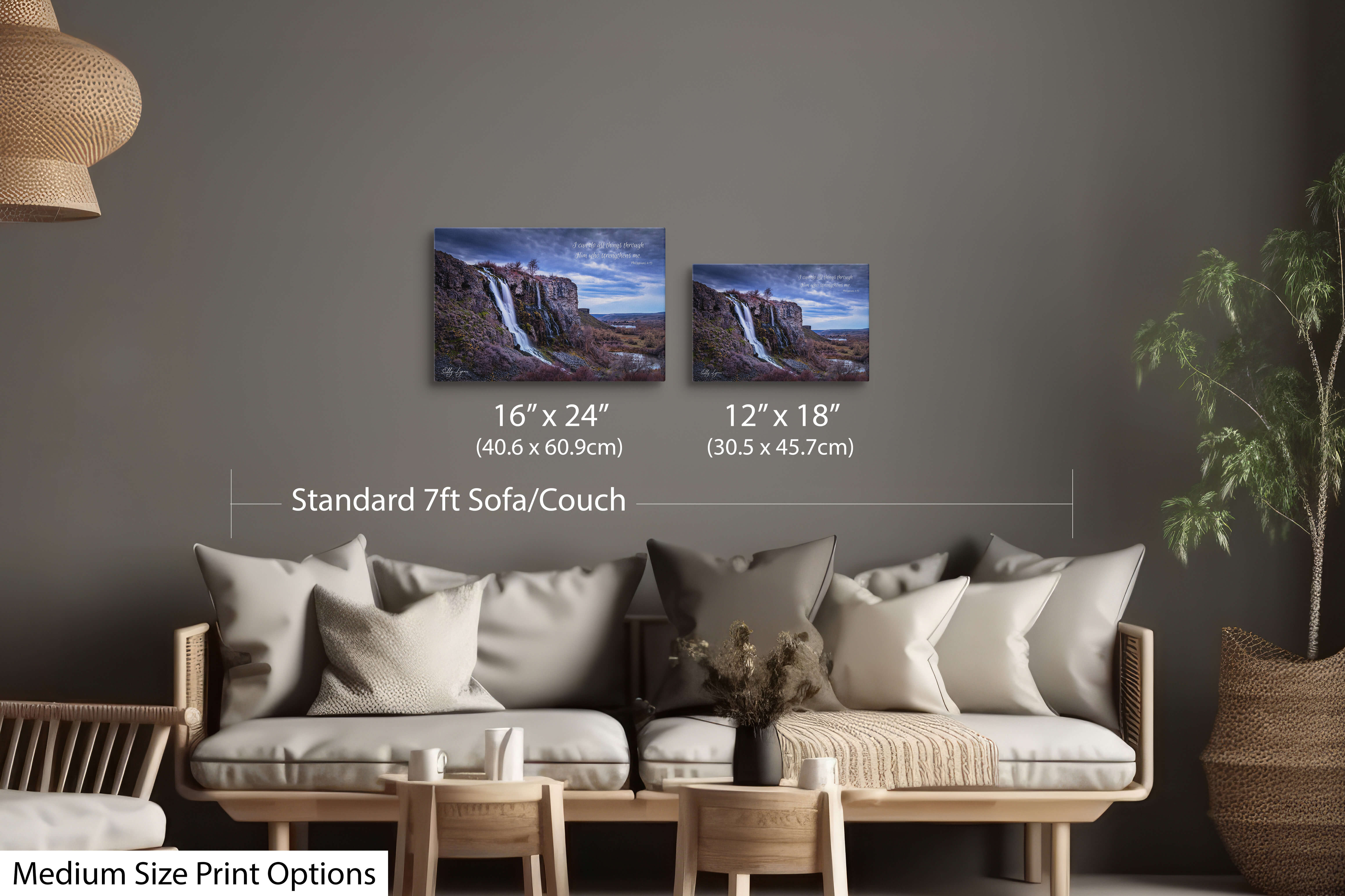 Pair of medium-sized prints featuring a cascading waterfall and Philippians 4:13 scripture, styled in a warm living room.