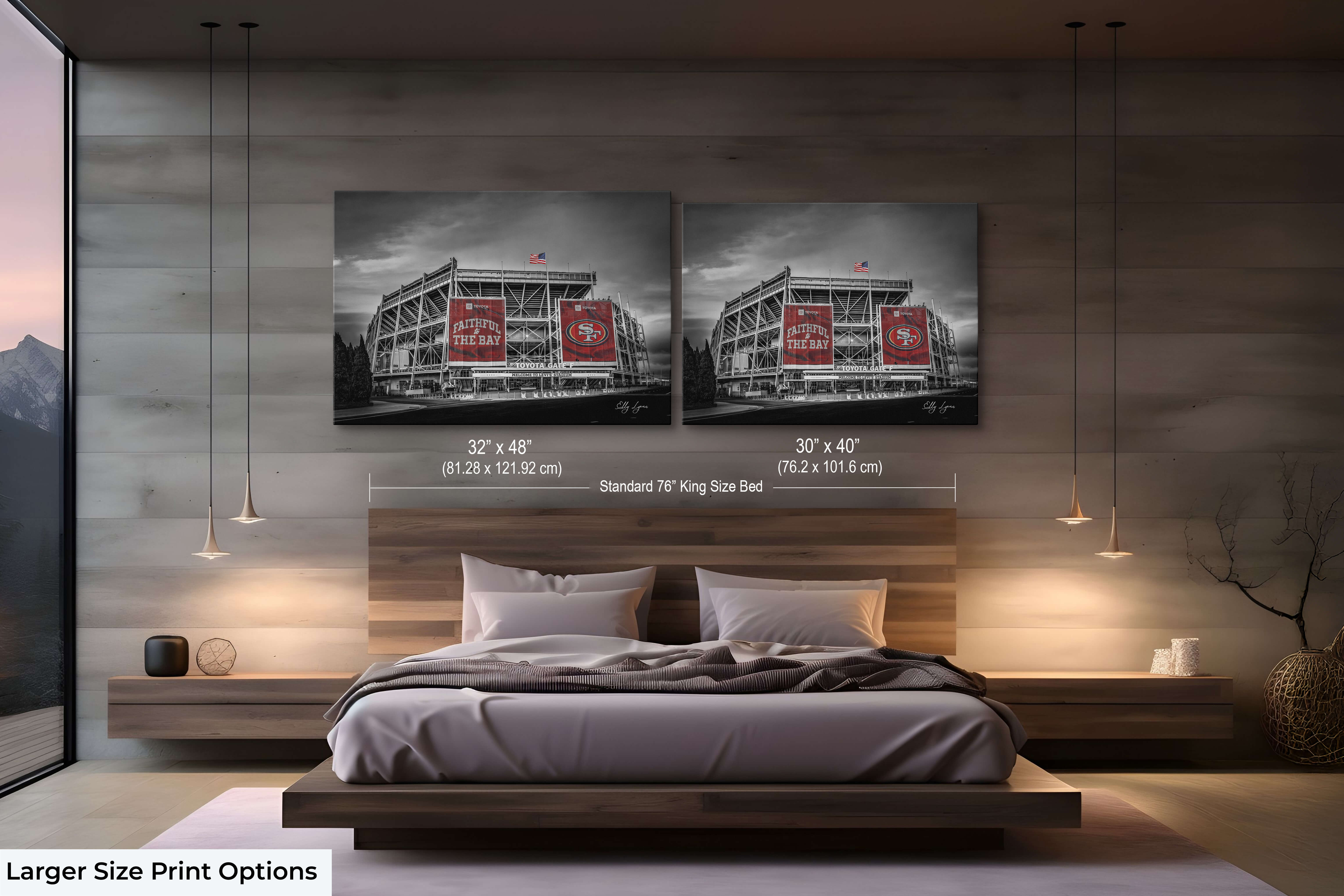 Large-format Levi’s Stadium art print in dramatic black and white with red banners styled above a king-size bed in a luxury bedroom.