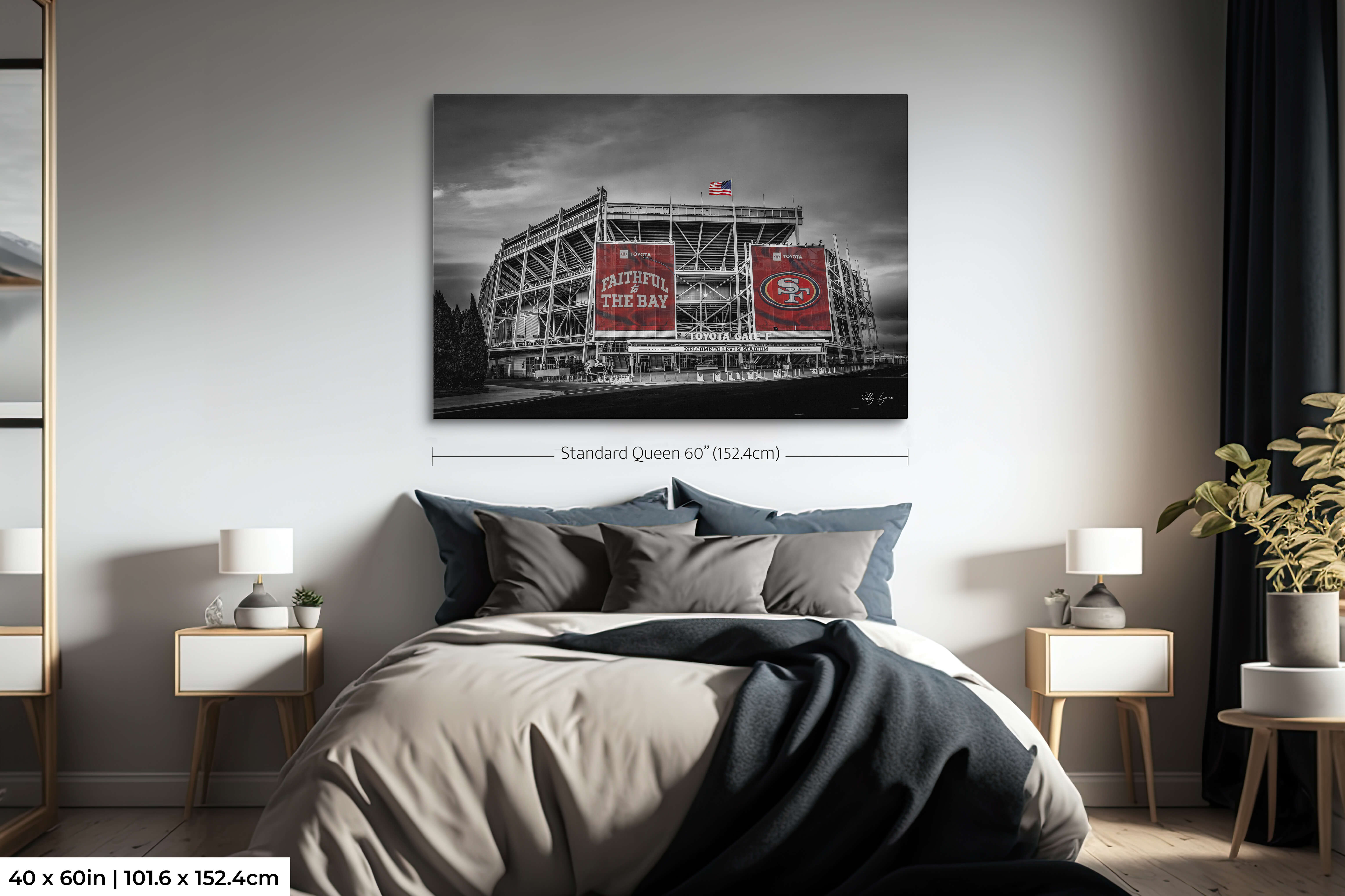 Oversized 40x60 single-panel Levi’s Stadium red-accent black and white print above a queen-size bed for scale visualization.