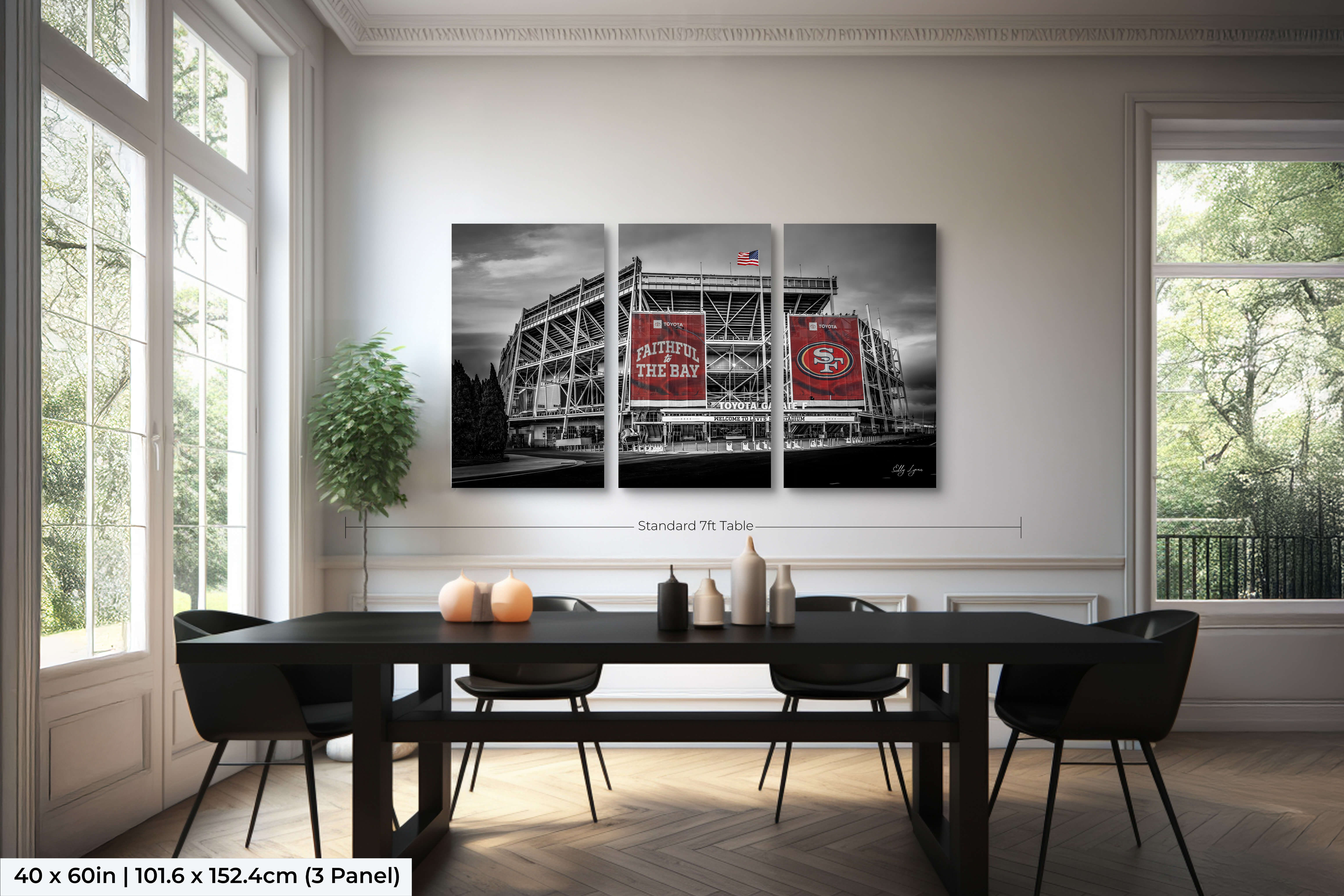 Three-panel 40x60 split version of Levi’s Stadium fine art in monochrome with red banners displayed over a 7ft dining table.