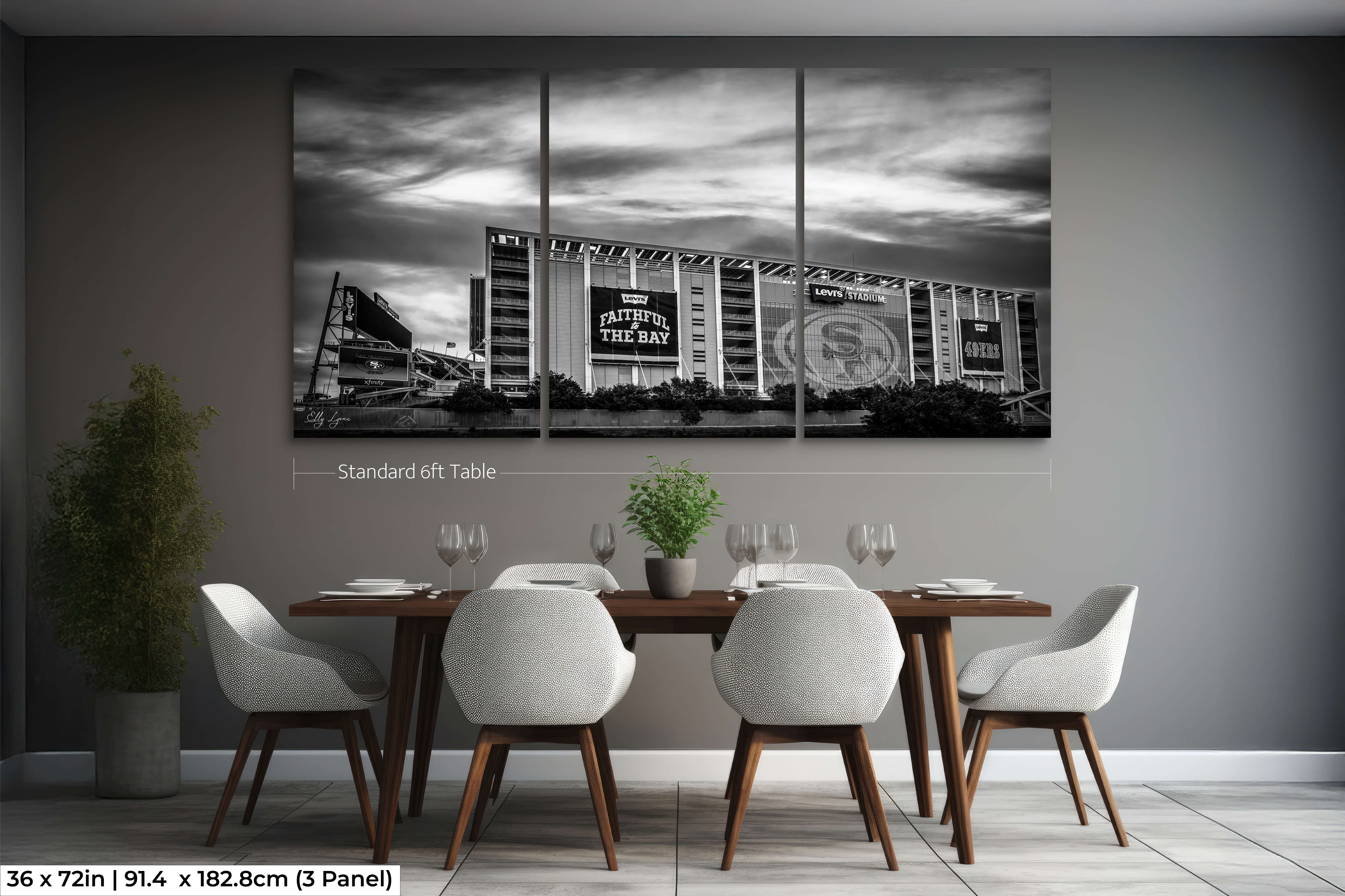 Large 36x72 three-panel black and white stadium artwork shown above a standard 6ft dining table, perfect for larger spaces and dramatic wall statements.