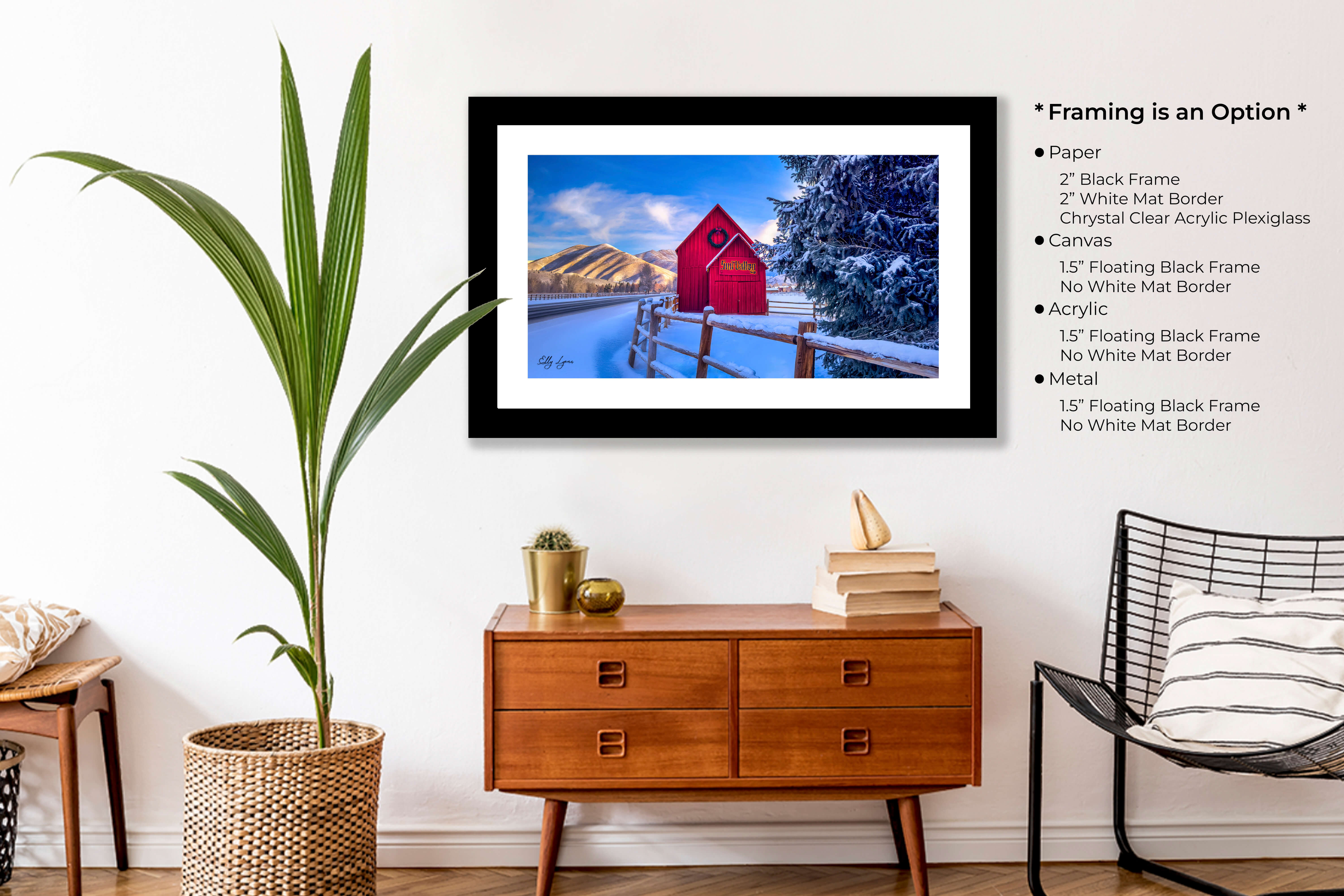 Winter-themed framed wall art featuring Sun Valley barn in a cozy living space – vibrant mountain landscape and snow-covered trees add rustic charm.