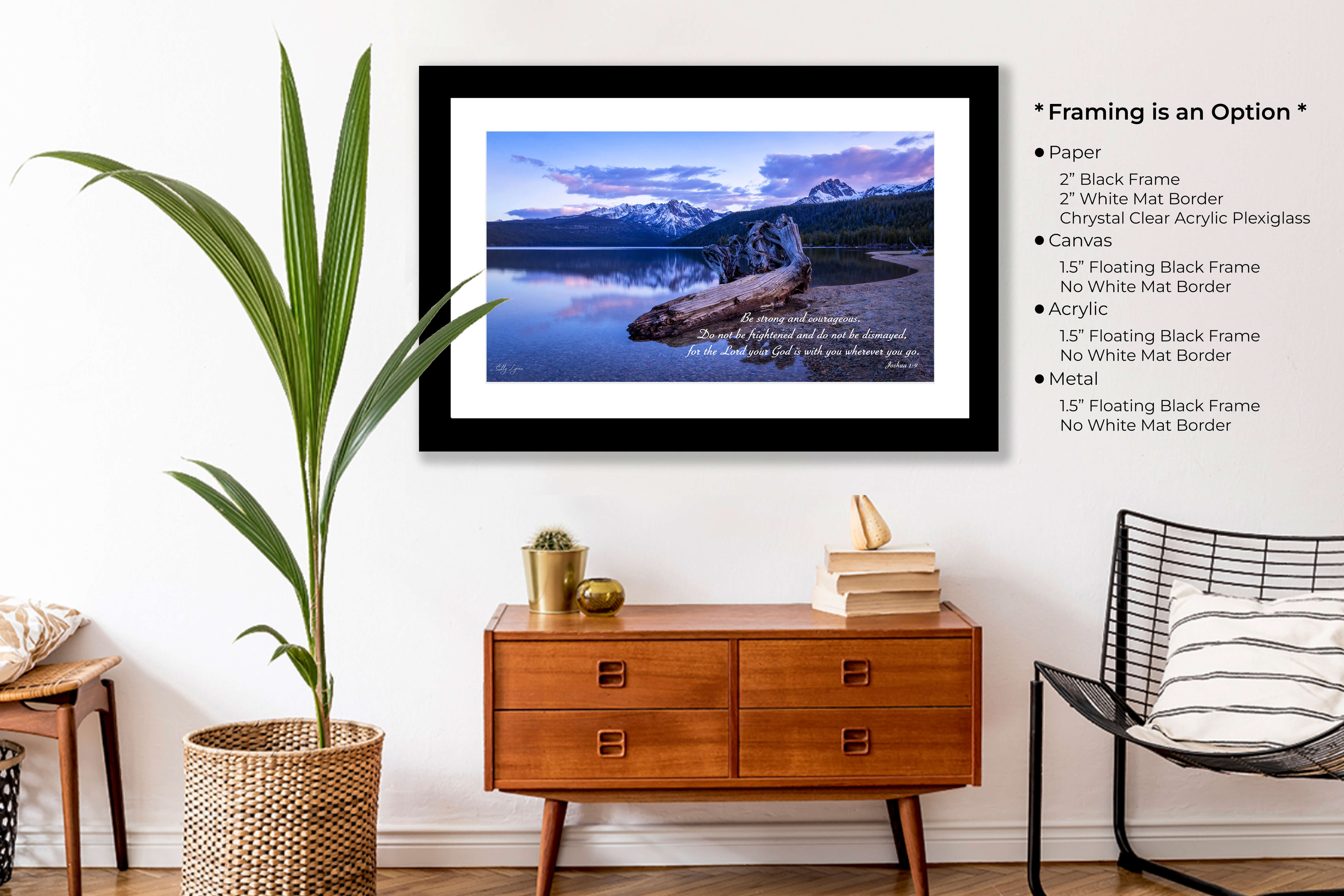 Framed Christian scripture print of lake and mountain landscape featuring Joshua 1:9 in a calming room setting